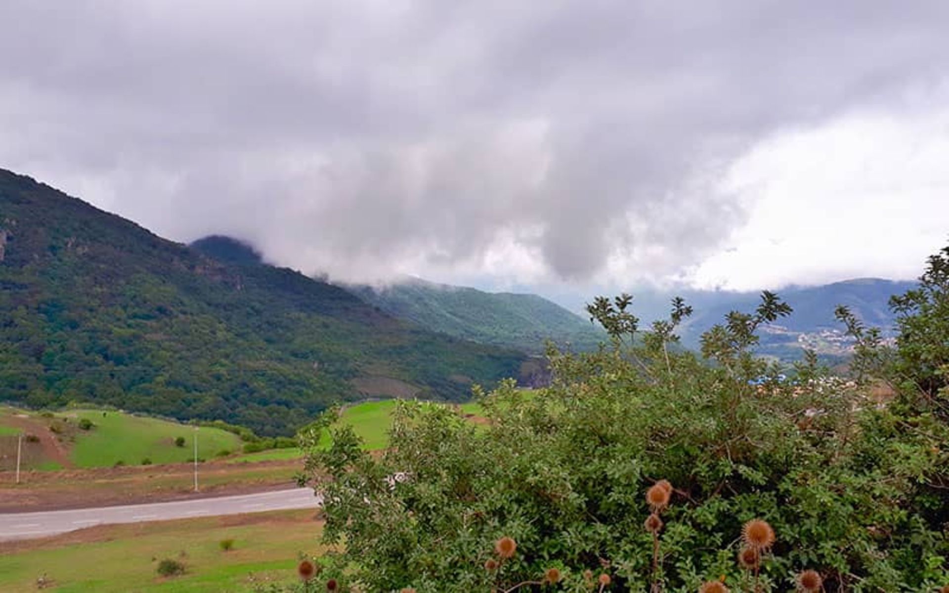 Cloudy weather and green vegetation of Hiran Pass