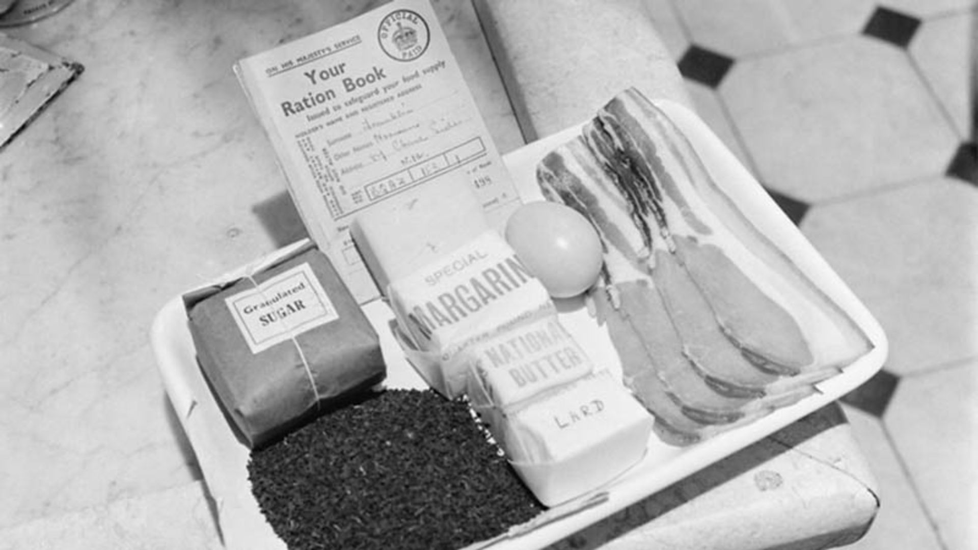 A person's meager weekly food ration during World War II