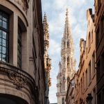 A view of tall buildings and historic towers in Brussels, Belgium