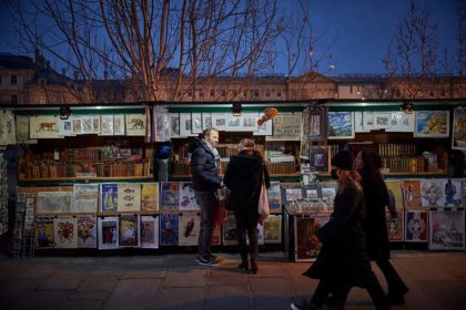 Selling old posters and magazines along with books