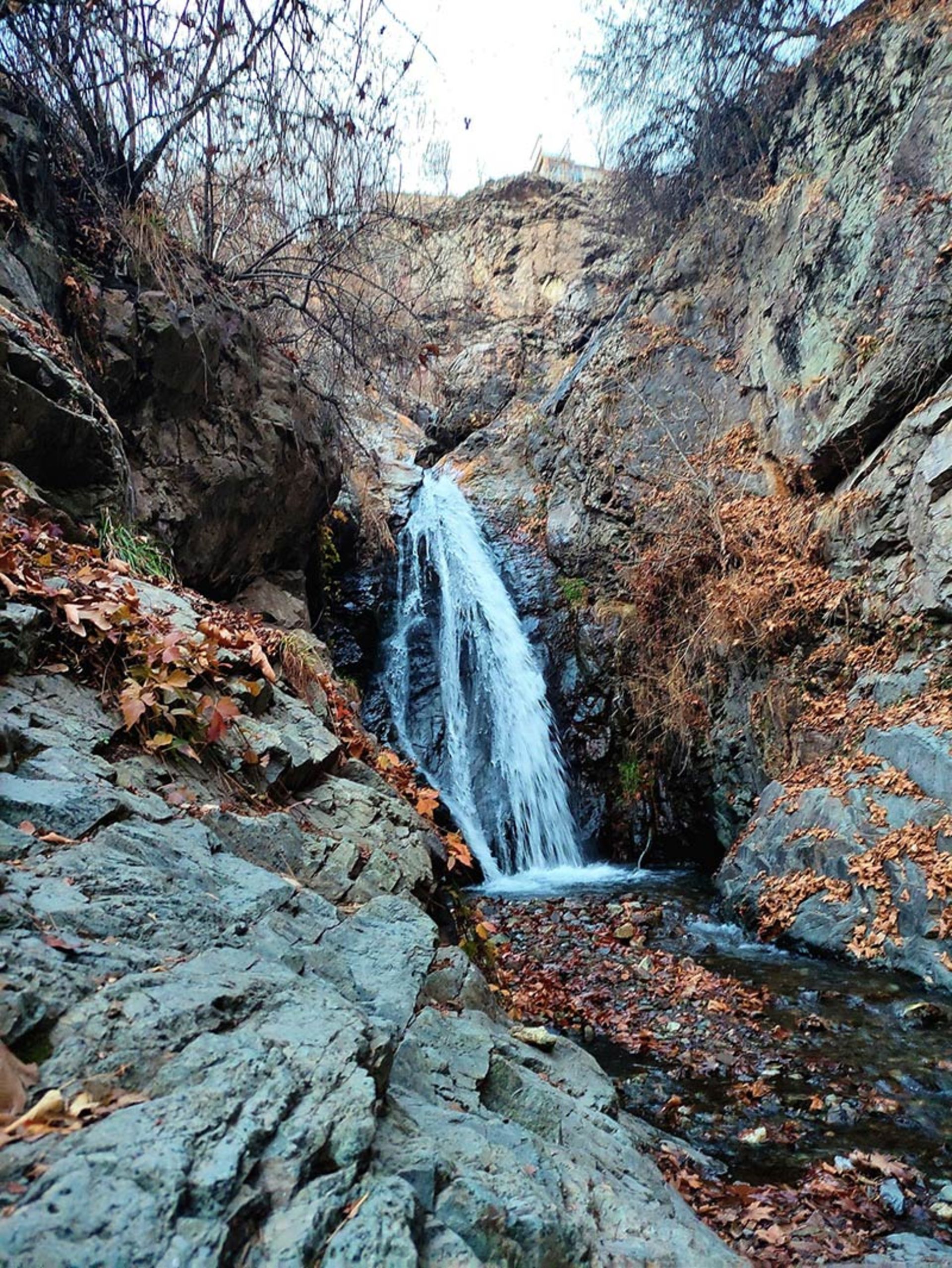 Lar Damavand gorge snow waterfall in autumn