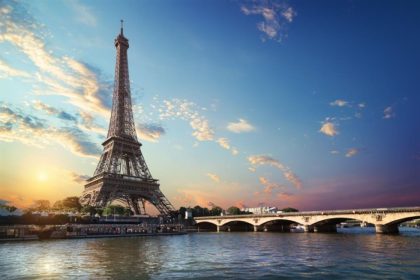 The Eiffel Tower by the Seine River in France