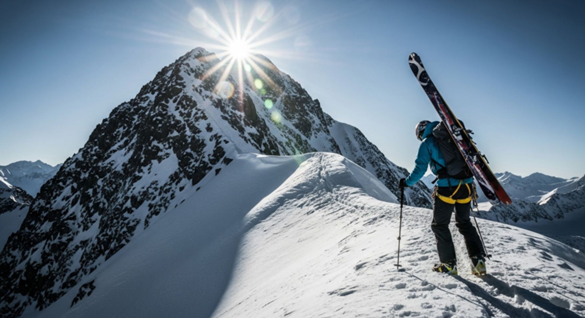 Eskimo athlete climbing a mountain