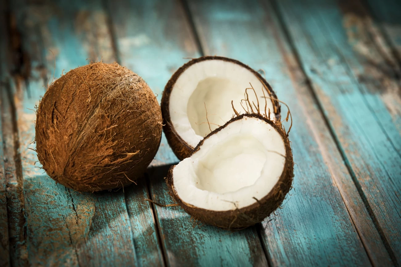 What are the benefits of eating coconut and coconut water during pregnancy for the fetus?