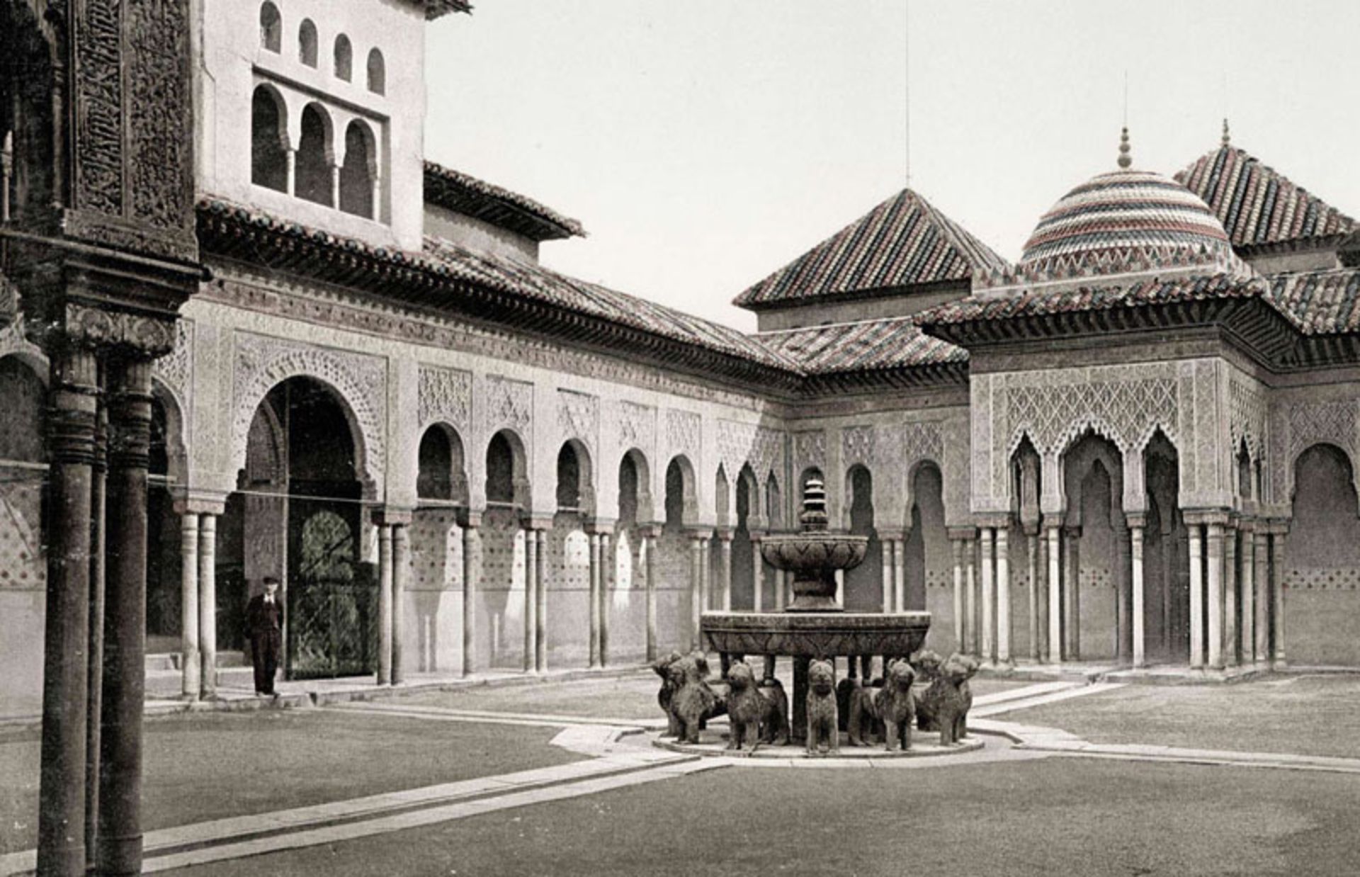 Old black and white photo of Alhamra Palace grounds and historical monument