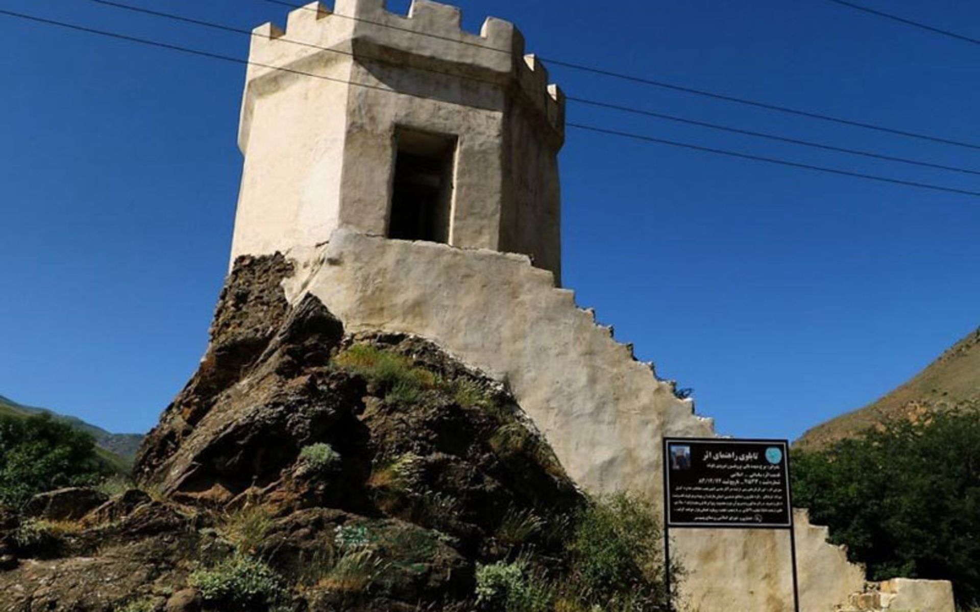 The stone building of Bavand Tower in Swadkoh in spring