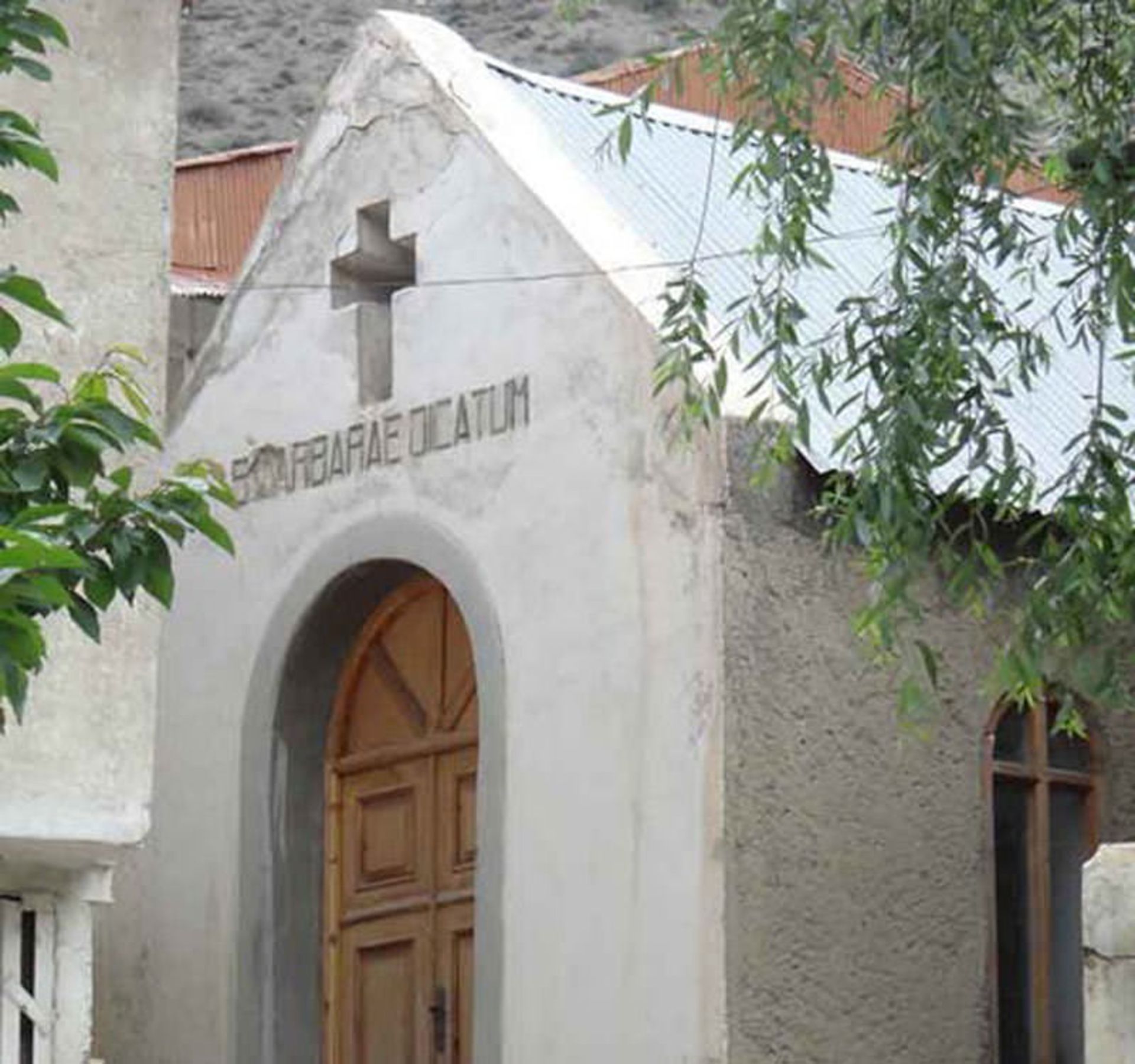 The wooden entrance door of the Sorkabad church