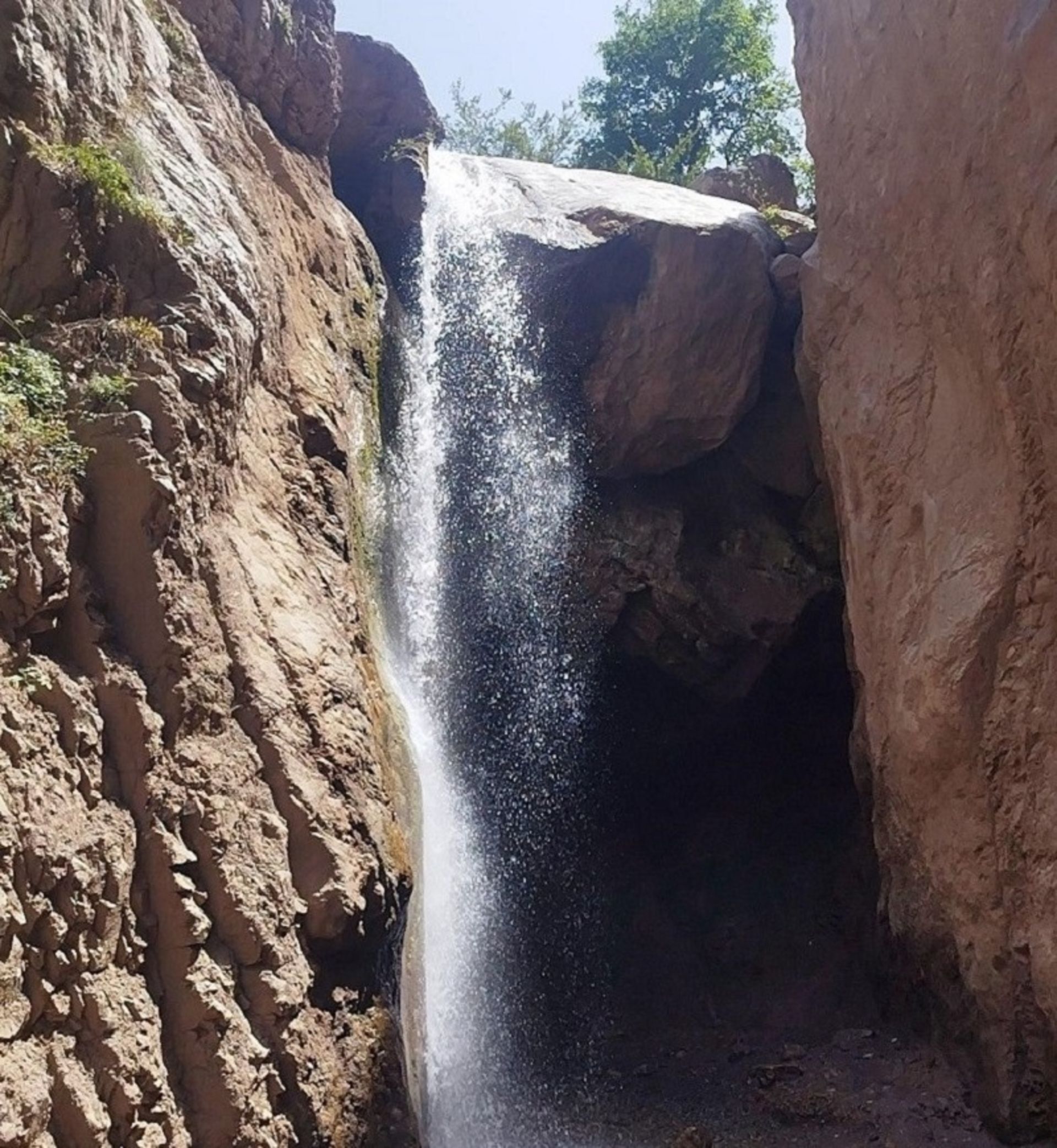 The height of Versk waterfall among the rocks