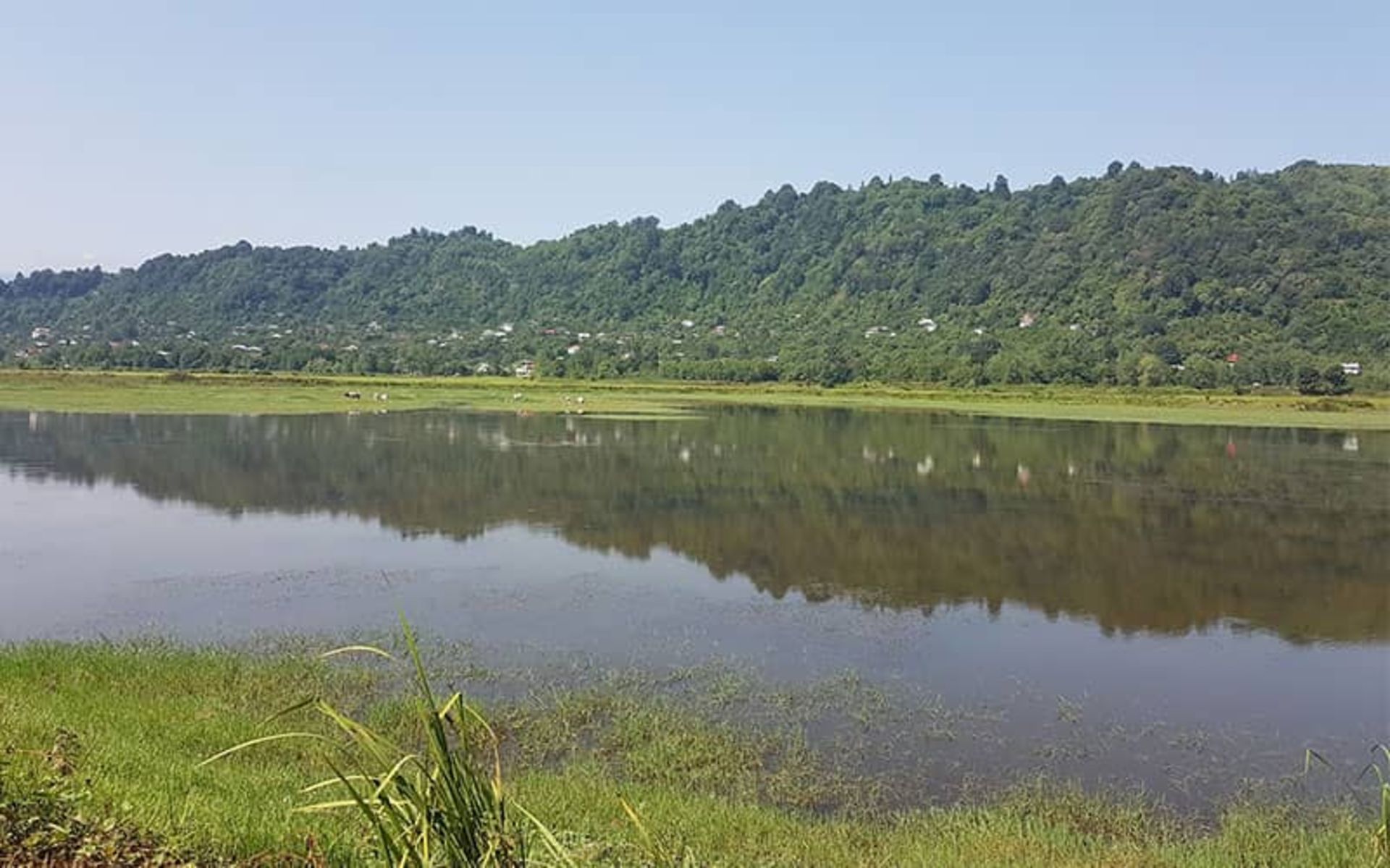 Komle roof next to the village's natural lake