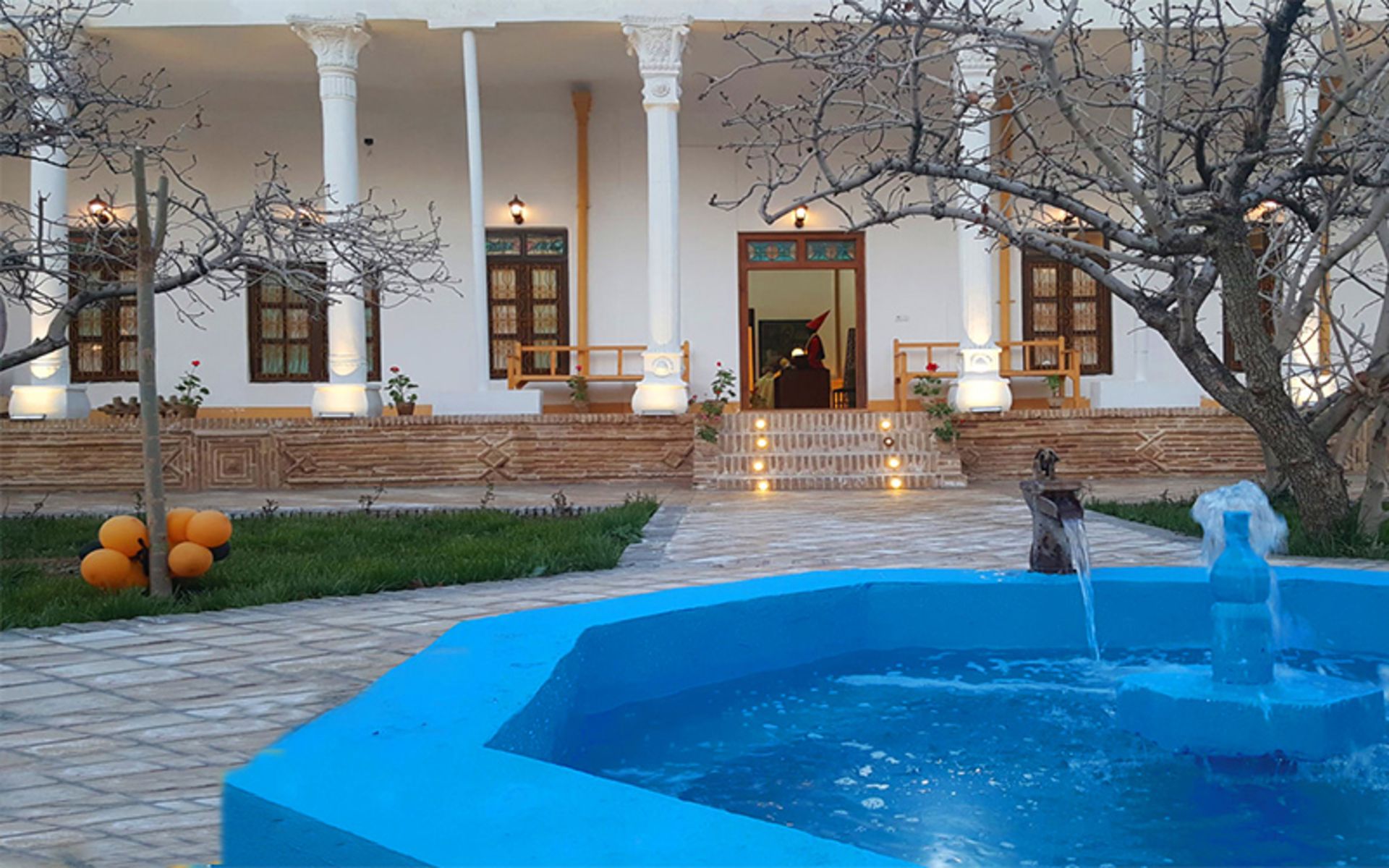 The courtyard of Amir's mansion and garden