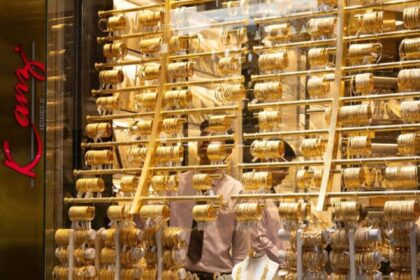 A close-up view of the window of a luxury jewelry store in Dubai