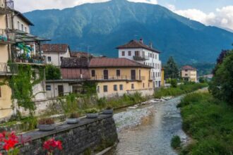 Colorful houses on the edge of a mountain river