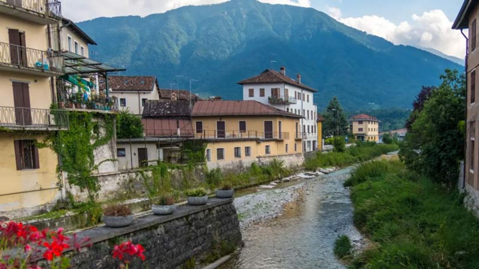 Colorful houses on the edge of a mountain river