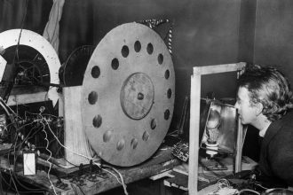 John Loggy Bird working with the television set in the laboratory