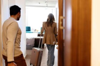 Entering passengers with wheeled luggage into the hotel room